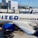 United cuts flights, but still sees strength for international vacations and premium seats